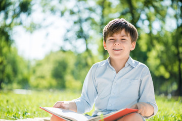 Boy in summer park