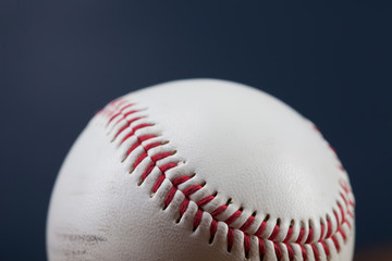 Baseball ball on wooden table