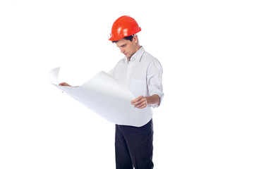 man in a shirt orange construction helmet with blueprints