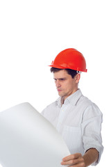 man in a shirt orange construction helmet with blueprints