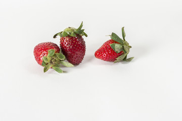 Strawberries on white