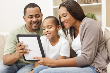 Fototapeta premium African American Family Using Tablet Computer
