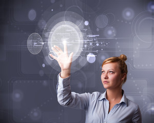 Attractive businesswoman touching abstract high technology circu