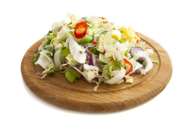 Sliced vegetables on wood