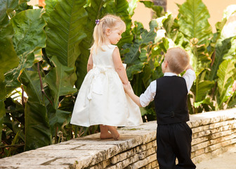 Boy helping girl
