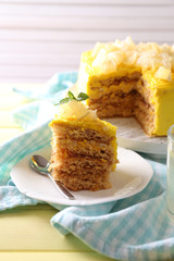 Tasty lemon dessert on wooden table