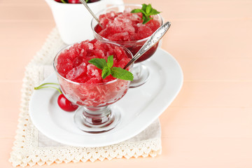 Closeup of cherry granita in glass bowls,