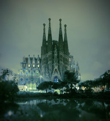 La Sagrada Familia cathedral view from the pond at night