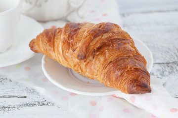 Fresh croissant on a table