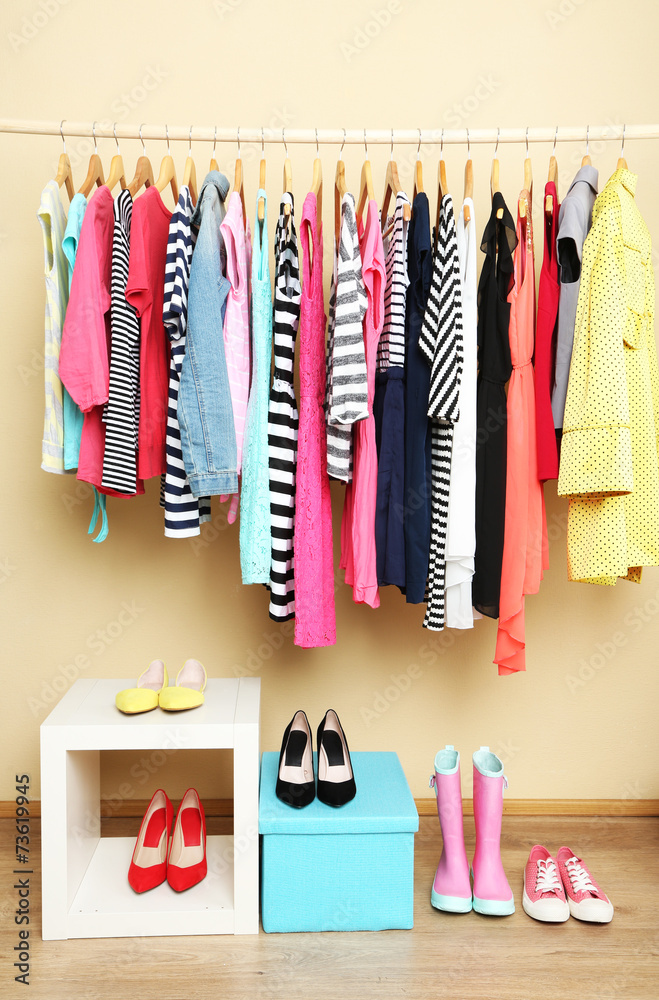 Wall mural colorful clothes and shoes in room