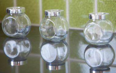 Empty glass transparent jar with silver cap