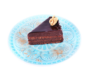 Delicious chocolate cake on plate isolated on white