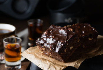 Homemade chocolate brownies with nuts and ganache