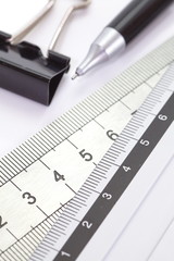 Stainless steel ruler with pencil and metal paper clip