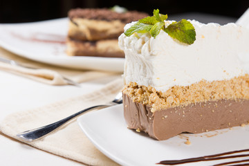 Slice of Tasty Layered Cake on White Plate