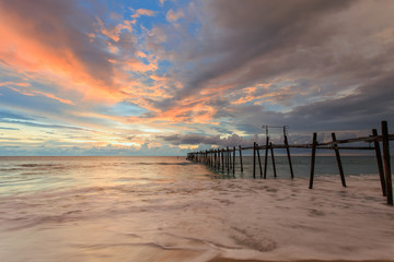 The long wood bridge at sunset sunset beach