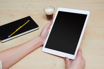 Looking at a blank screen on a digital white tablet