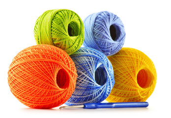 Colorful yarn for crocheting and hook isolated on white