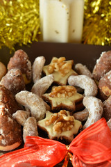 Various Christmas Cookies On The Brown Plate