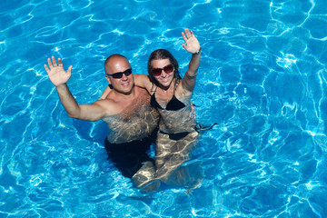 Loving couple in pool