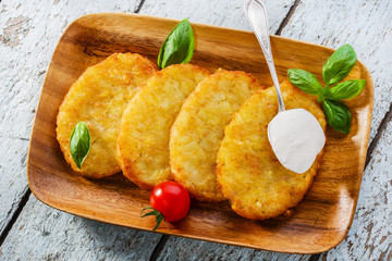 potato pancakes with sour cream