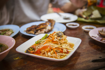 spicy papaya salad with salted crab and fermented fish