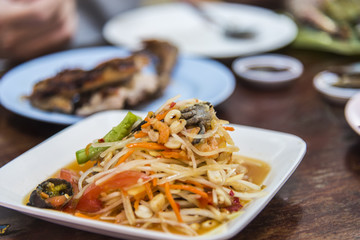 spicy papaya salad with salted crab and fermented fish