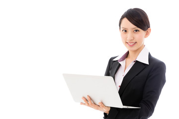 asian businesswoman using laptop on white background