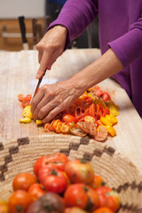 Heirloom tomatoes being cut