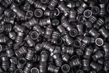 Top view of the cartridges for pneumatic weapon. Background