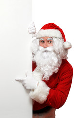 Naklejka premium Weihnachtsmann mit Tafel