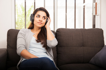 Obraz premium Listening to music at home