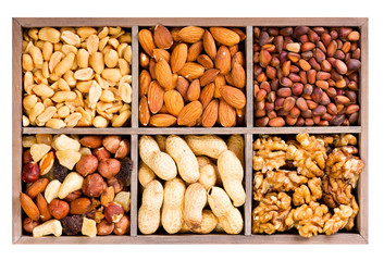 various dried nuts in wooden box