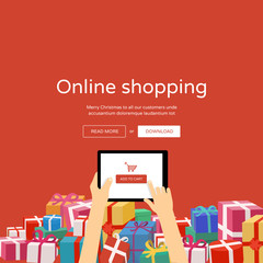 Online shopping - hands with tablet & christmas gifts