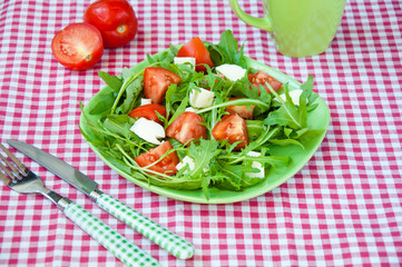 Greece salad with mozzarella, ruccola and tomatoes