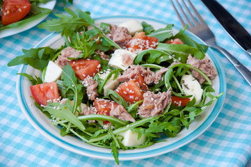 fresh salad with tomatoes, ruccola and tuna