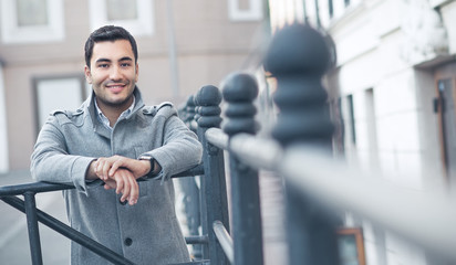 Young attractive man posing, outdoor