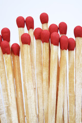 Set of red matches isolated on white background.