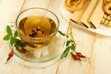 cup of tea, cookies and a briar