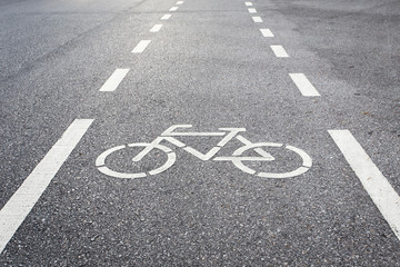 Bicycle sign or icon and movement  of cyclist in the park