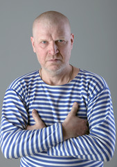 Fototapeta premium portrait of a man in a striped vest