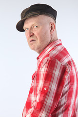 Portrait of an adult man in a plaid shirt
