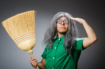 Funny man with brush and wig
