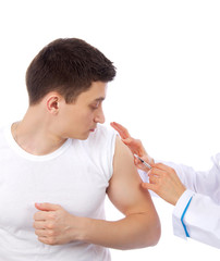 Doctor make flu vaccination or insulin injection