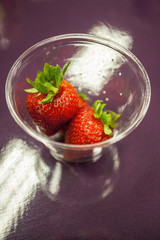 Fresh strawberries in a glass