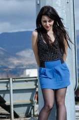 Beautiful woman posing in subway station
