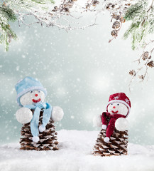 Winter snowy scenery with snow men