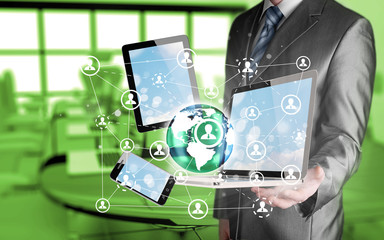 Business man using tablet PC and smartphone social connection