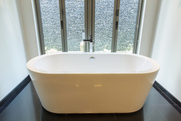 Bathtub in bathroom