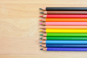 Obraz premium Color Pencils on wood texture